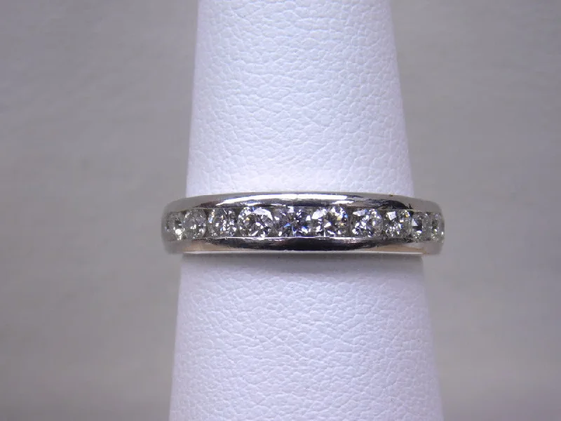 Custom Engagement Rings For Fashion-Forward Brides-ESTATE PLATINUM .75 CT CHANNEL SET BAND