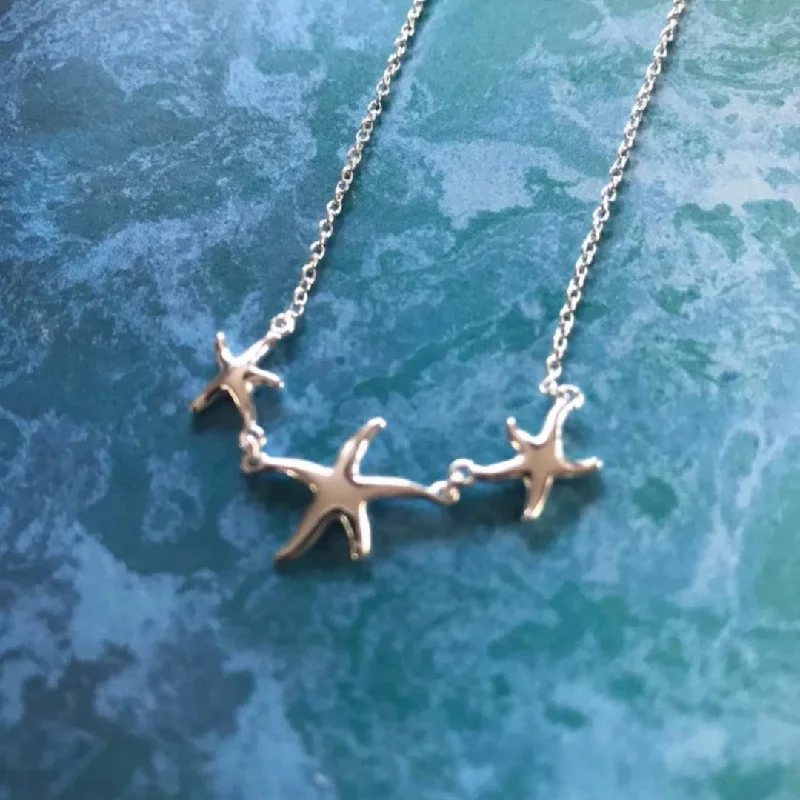 Trendy Pendant Necklace For Evening Parties-Shaz's Triple Starfish Necklace