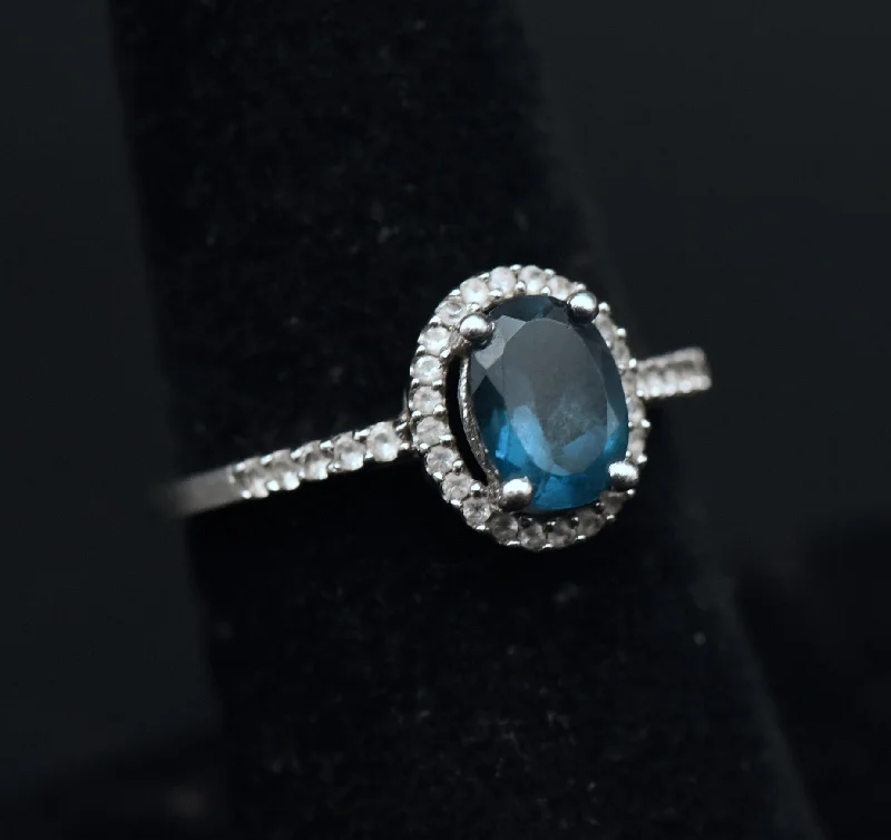 Simple Gold Wedding Bands For Bridesmaids-Vintage Blue Topaz Sterling Silver Halo Ring - Size 7